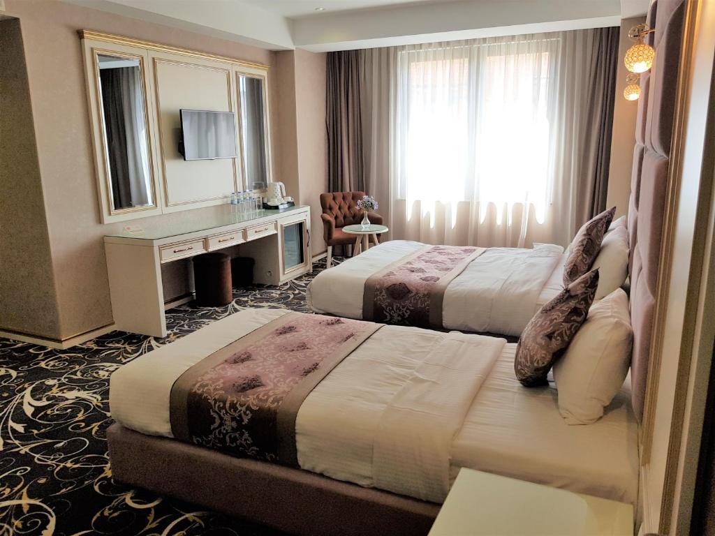 Quadruple Room (4 Pax) – Included Breakfast