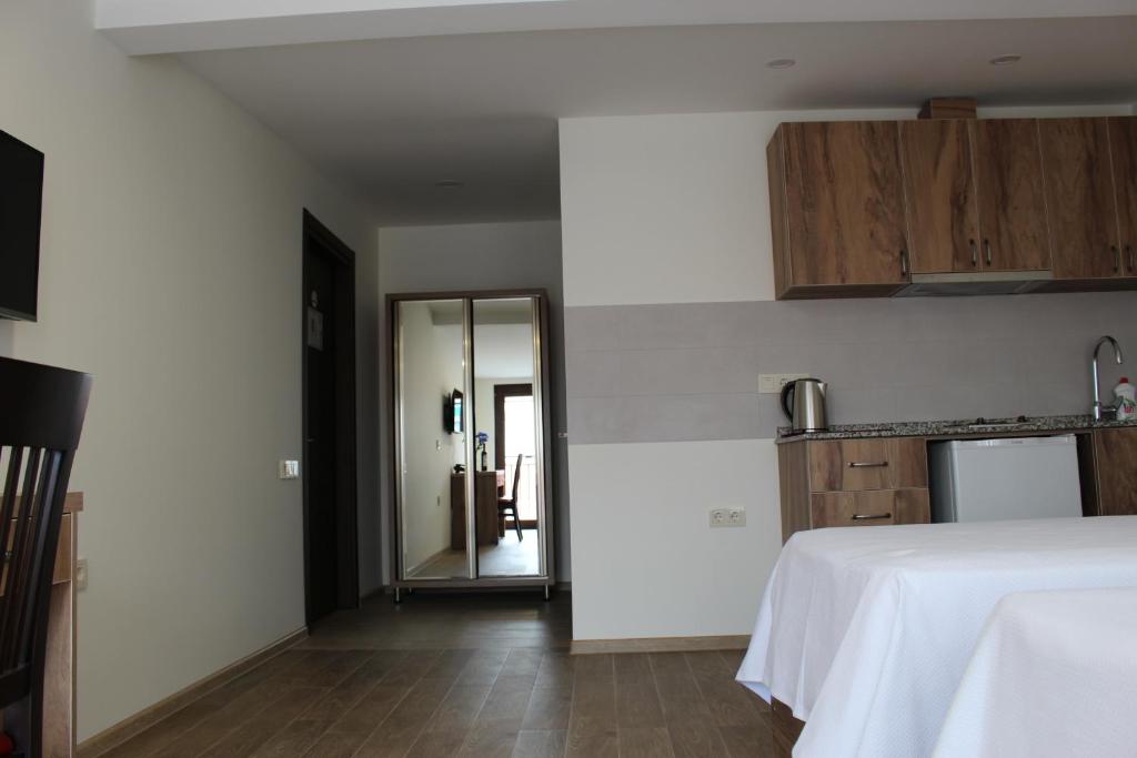 Studio with Balcony – Room Only
