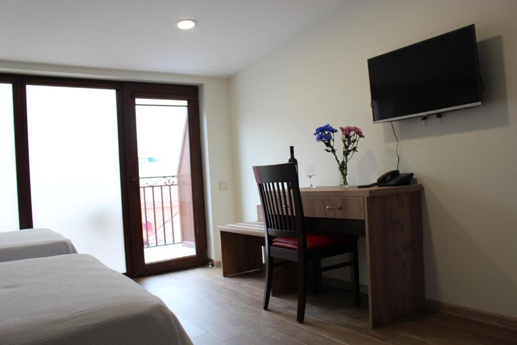 Studio with Balcony – Room Only