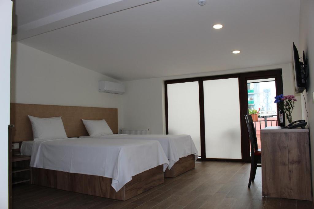 Studio with Balcony – Room Only